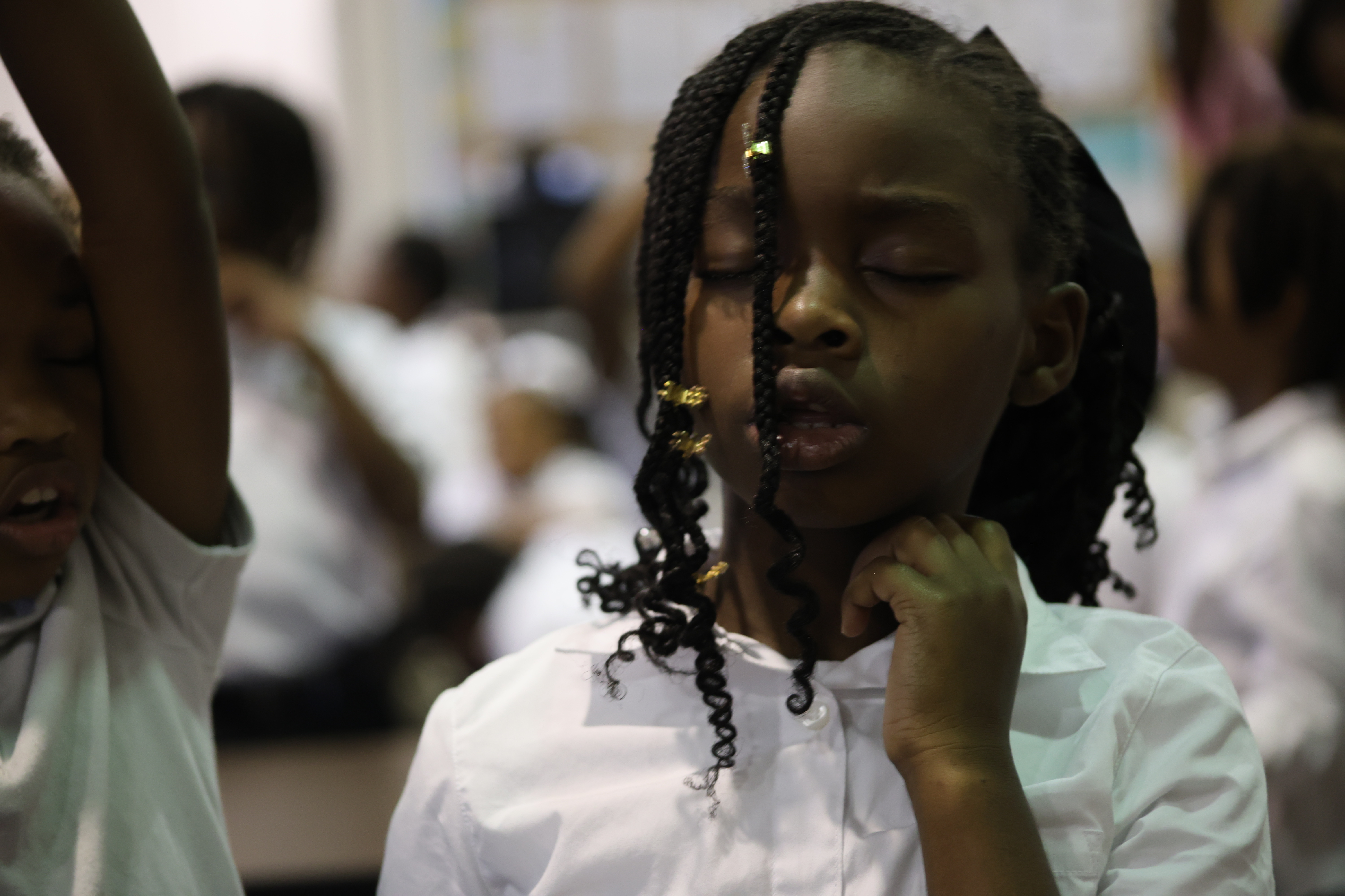FAMA mentors working with youth in the neighborhood