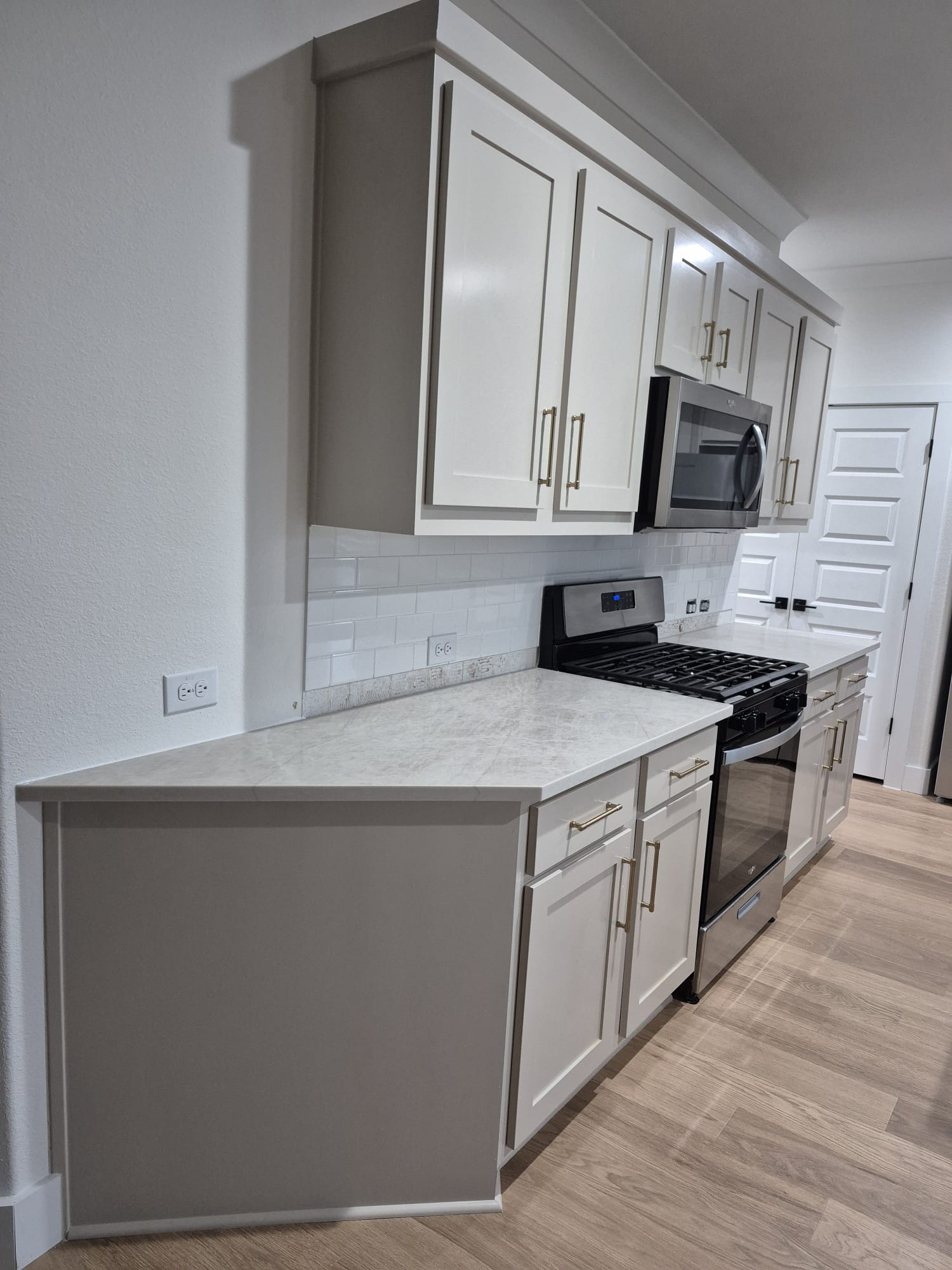Contemporary Subway Tile & Quartz Counters — Interiors by Sevilla Remodeling LLC