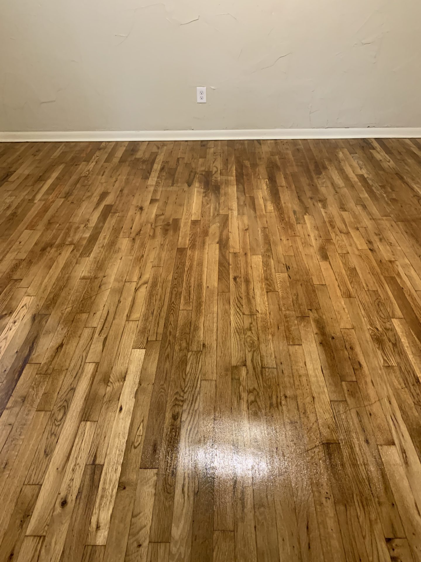 Refinished hardwood floor in a Dallas-Fort Worth home