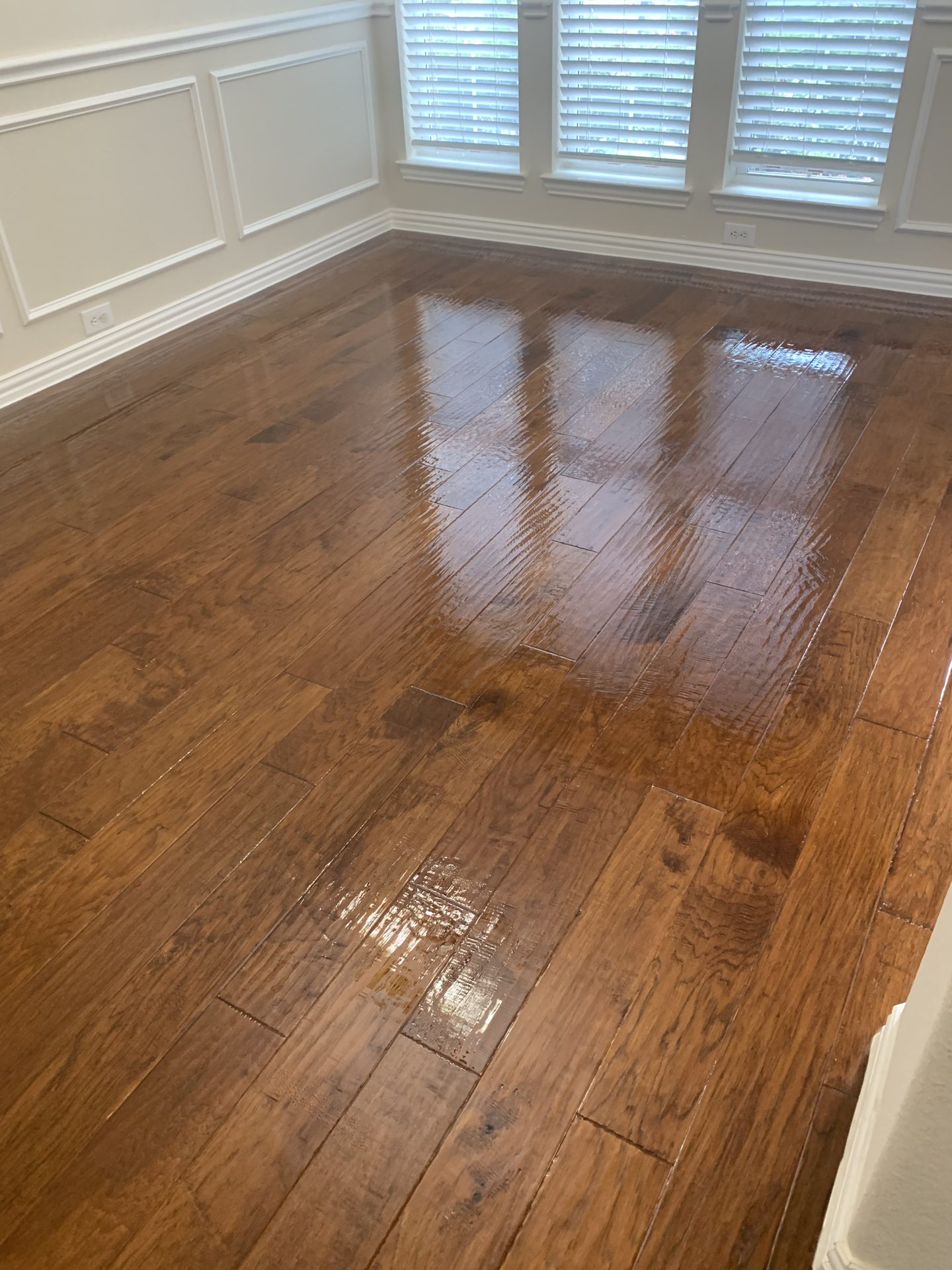 Refinished hardwood floor in a Dallas-Fort Worth home