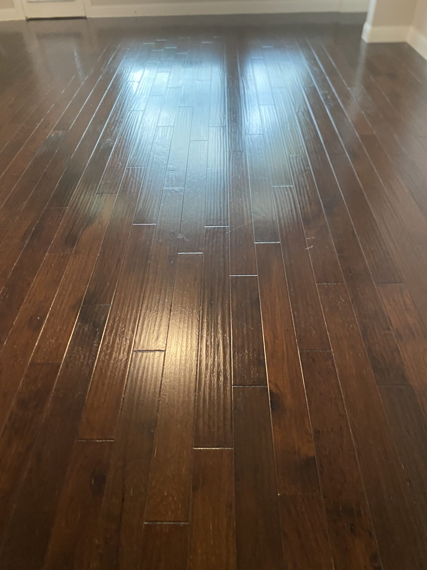 Refinished hardwood floor in a Dallas-Fort Worth home