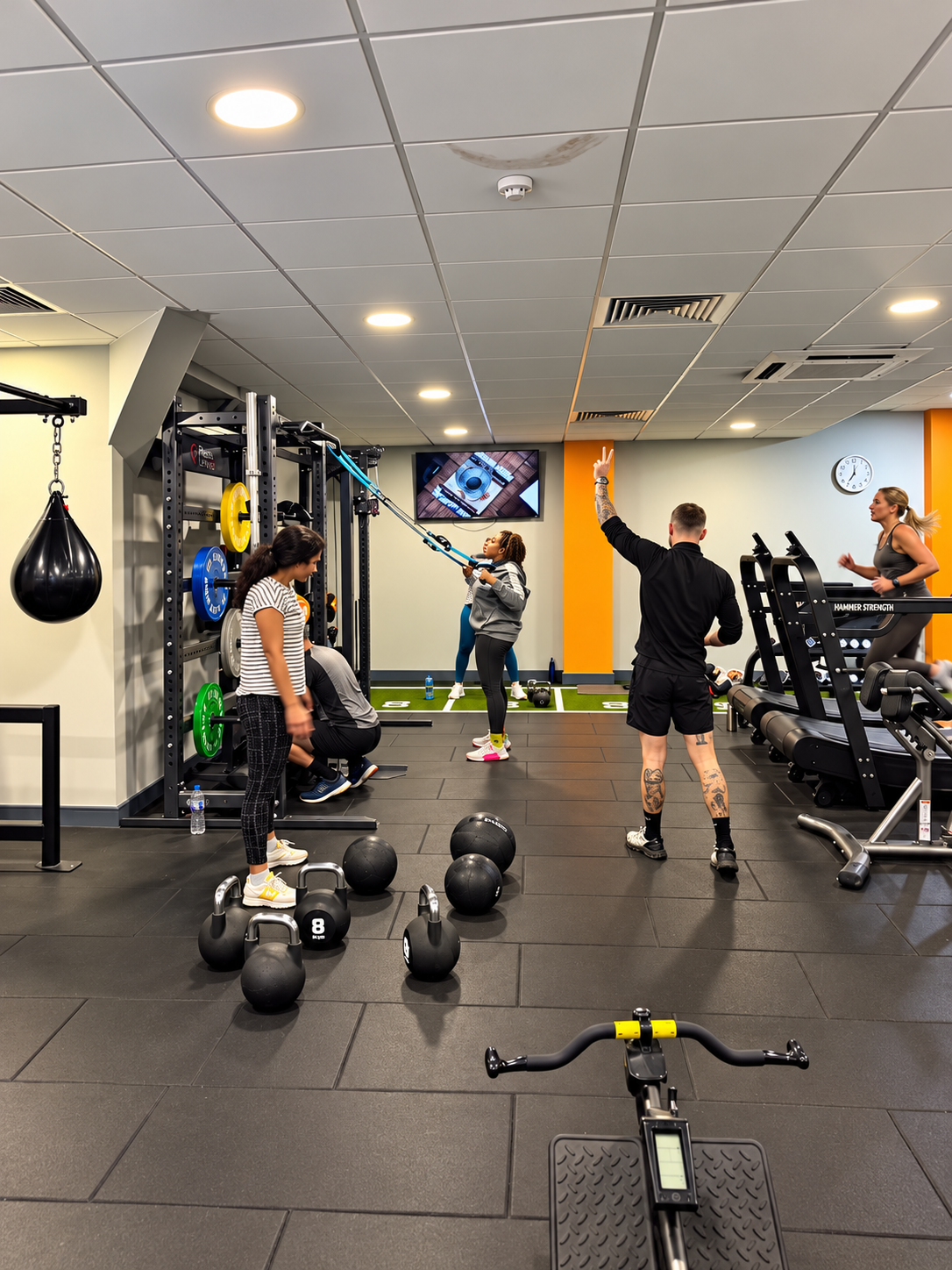 Tommy Rowlands coaching an energetic group and personal training session inside Loddon Valley Leisure Centre gym in Reading