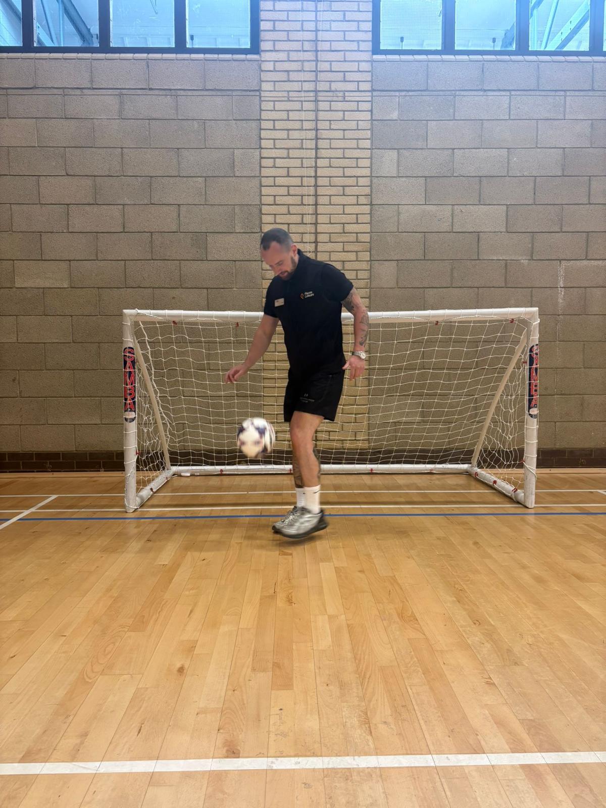 Tommy Rowlands juggling football demonstrating walking football skills in Reading