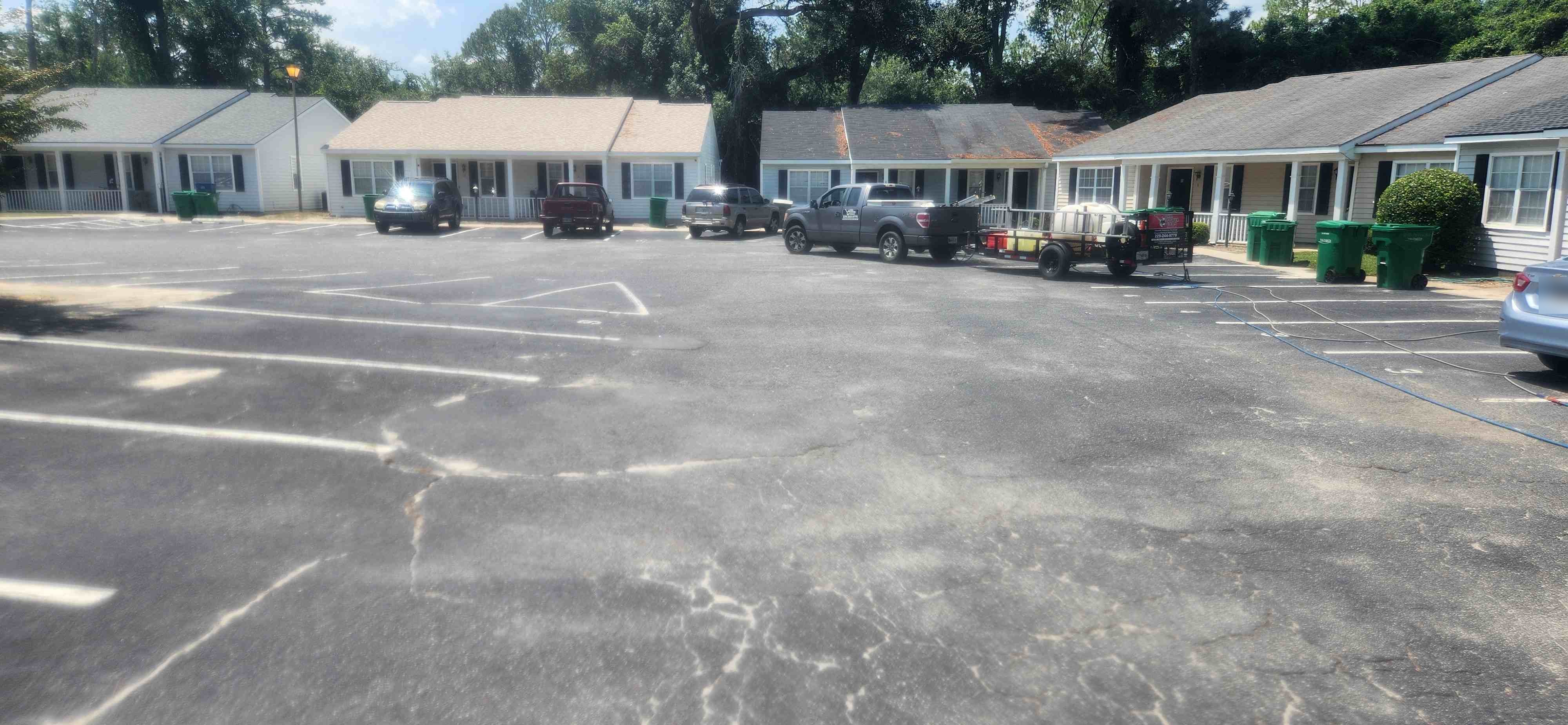 Commercial parking lot flatwork, driveways, and storefront walkways pressure washing in South Georgia