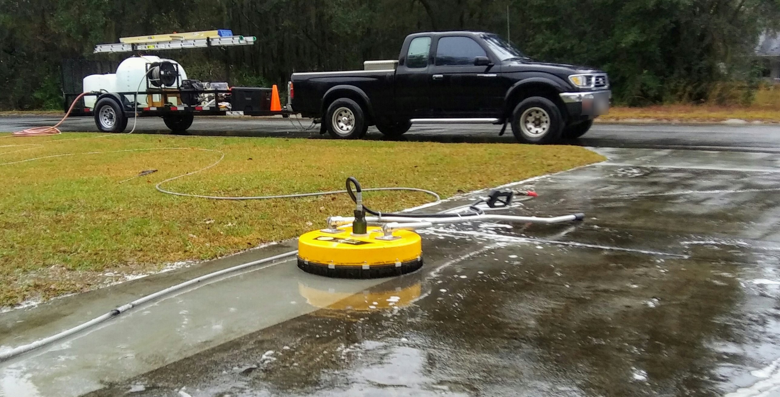 Mr Power Clean rotary surface cleaner and truck washing commercial concrete drive approaches in South Georgia