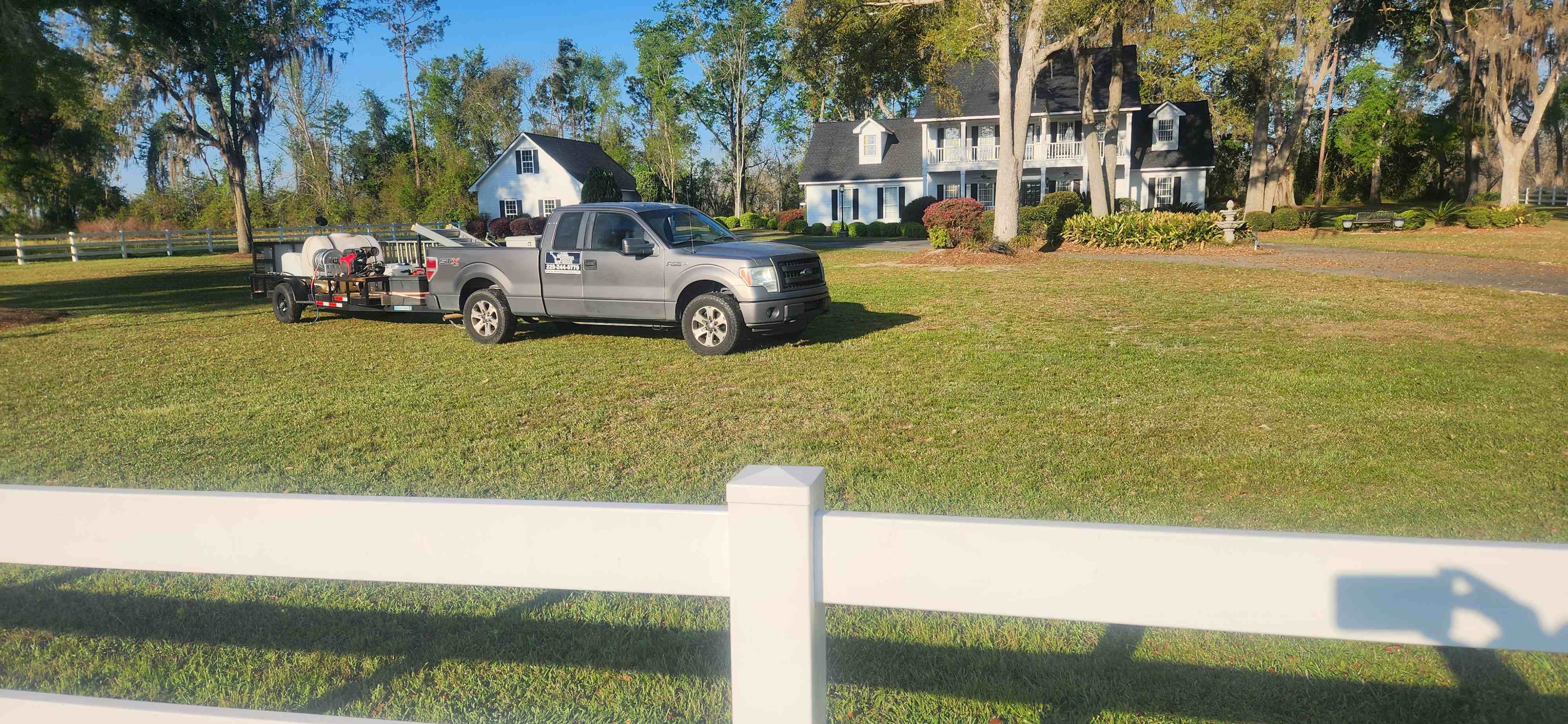 Mr Power Clean Pressure Washing truck and wash rig parked at a residential property in South Georgia