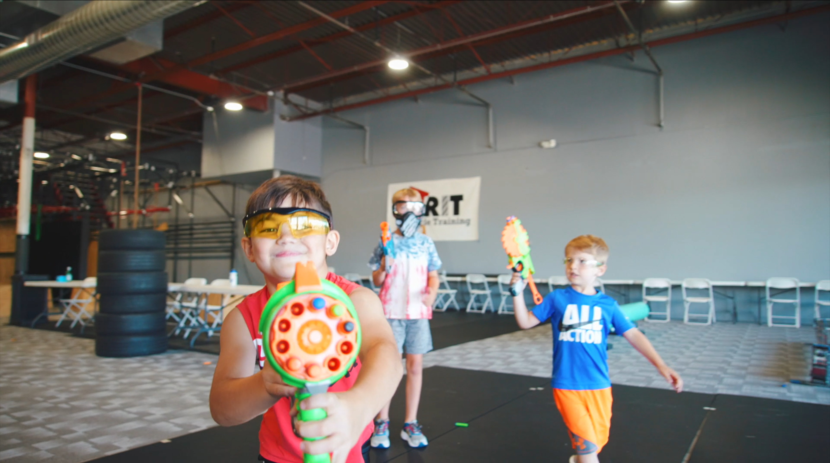Kids playing NERF games at GRIT summer camp