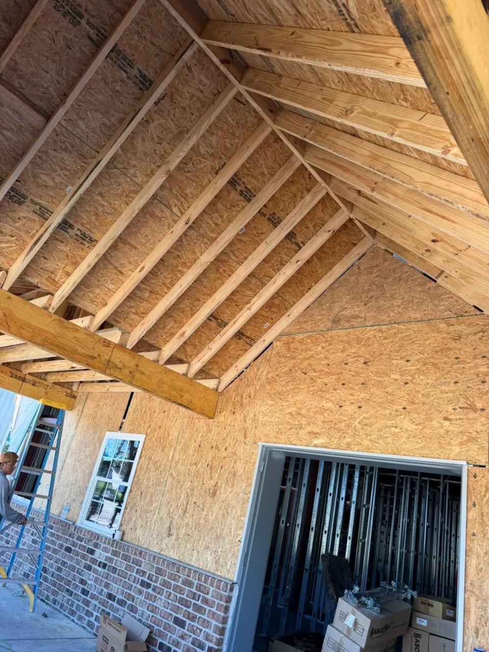 Covered Portico Ceiling Framing & OSB Sheathing — JM Elite Builders LLC project in Statesboro, GA