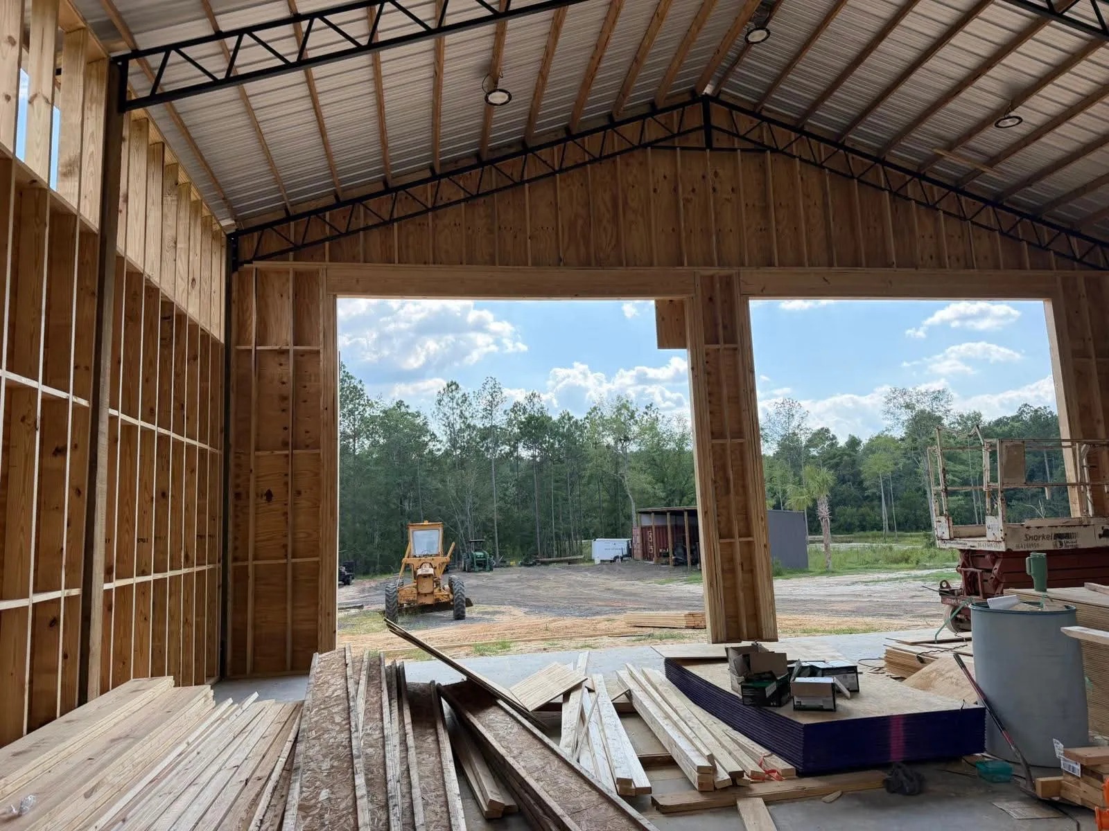 Steel Truss & Timber Barn Frame Construction — JM Elite Builders LLC project in Metter, GA