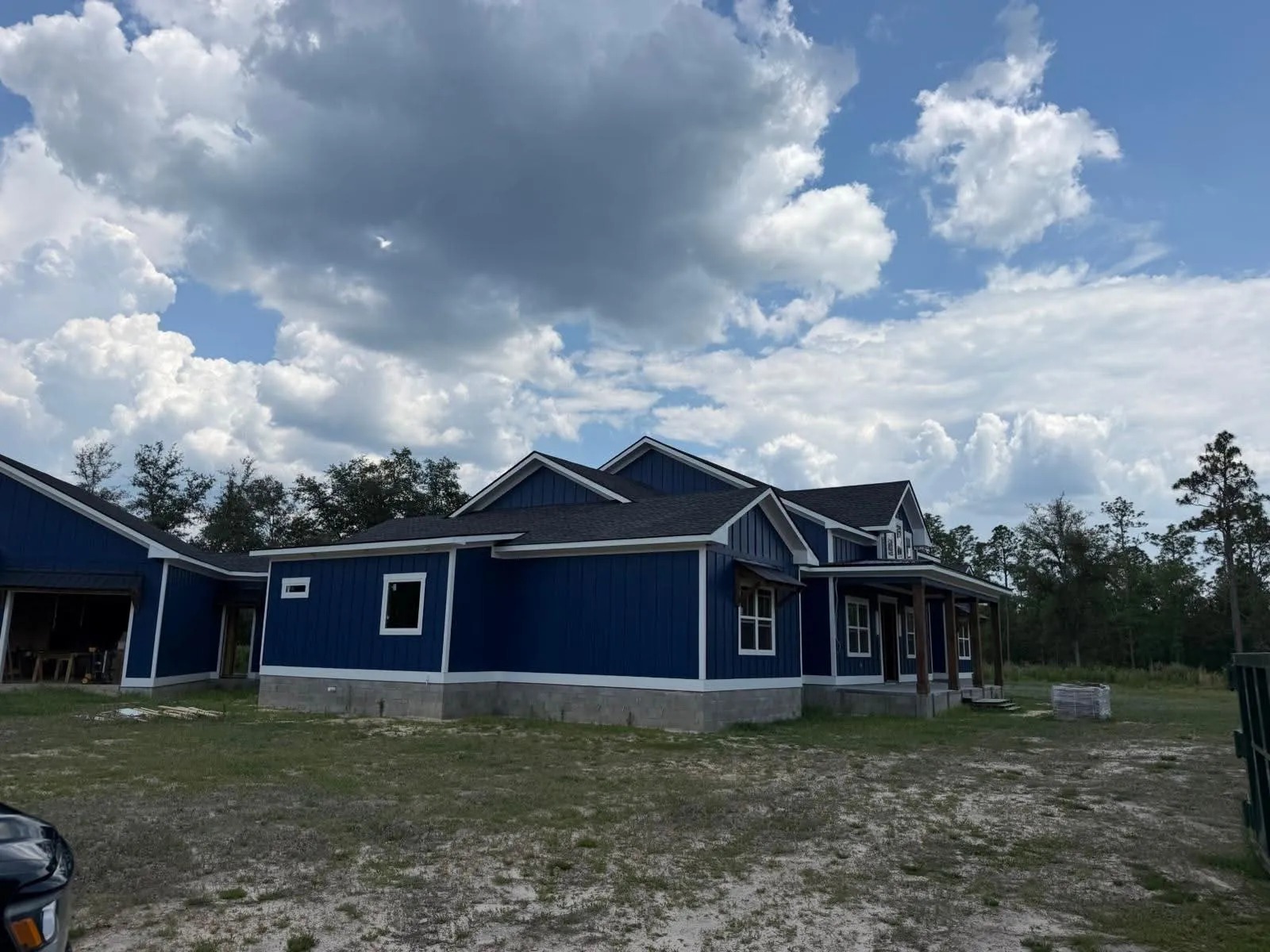 Custom Blue Board & Batten Farmhouse Build — JM Elite Builders LLC project in Statesboro, GA