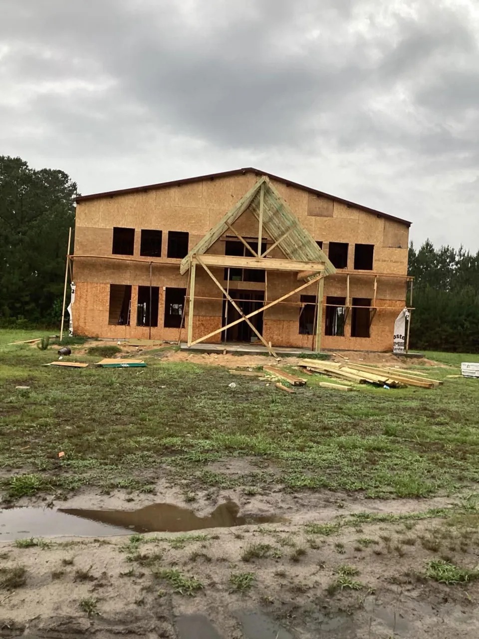 Two-Story Custom Home Frame & Gabled Entry — JM Elite Builders LLC project in Metter, GA