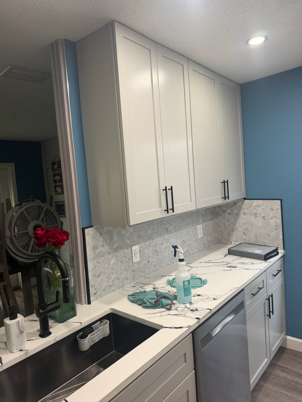 Calacatta Quartz Countertop with Chevron Mosaic Backsplash & Custom Cabinets