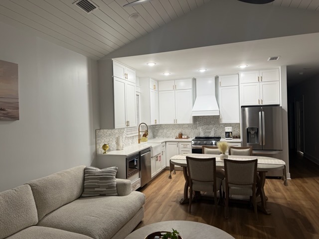 Spacious Living & Dining Kitchen Renovation with Custom Tile Backsplash