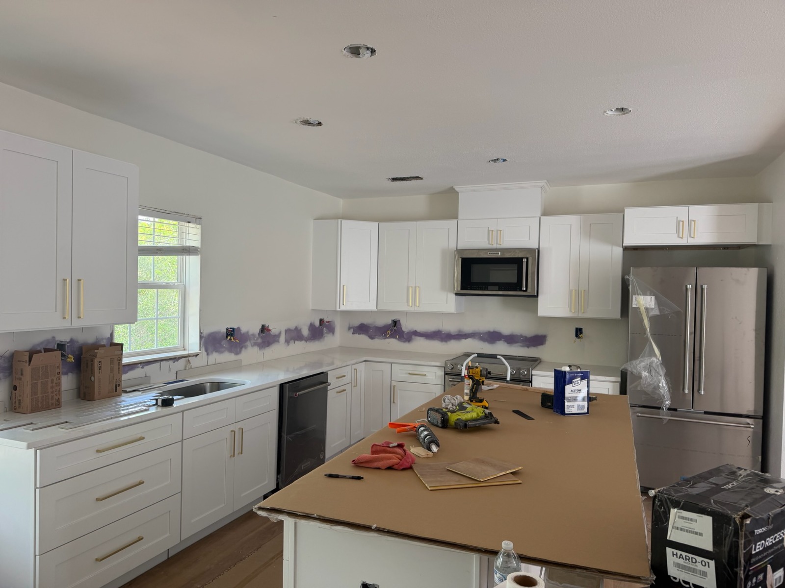 Full White Shaker Kitchen Renovation with Gold Pulls & Large Island