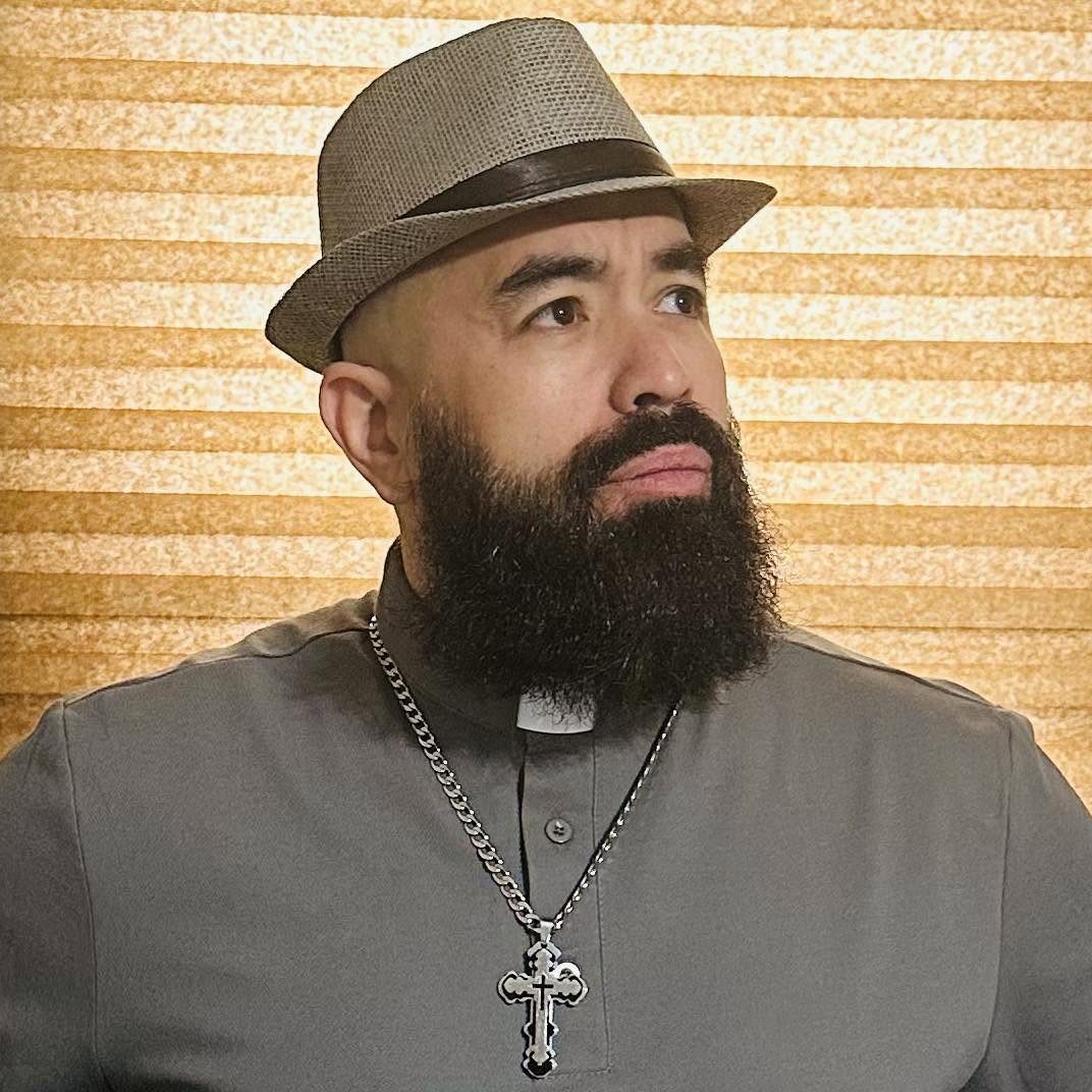 Portrait of Rev. Emilio Román, USMC, Roll Call Live co-host
