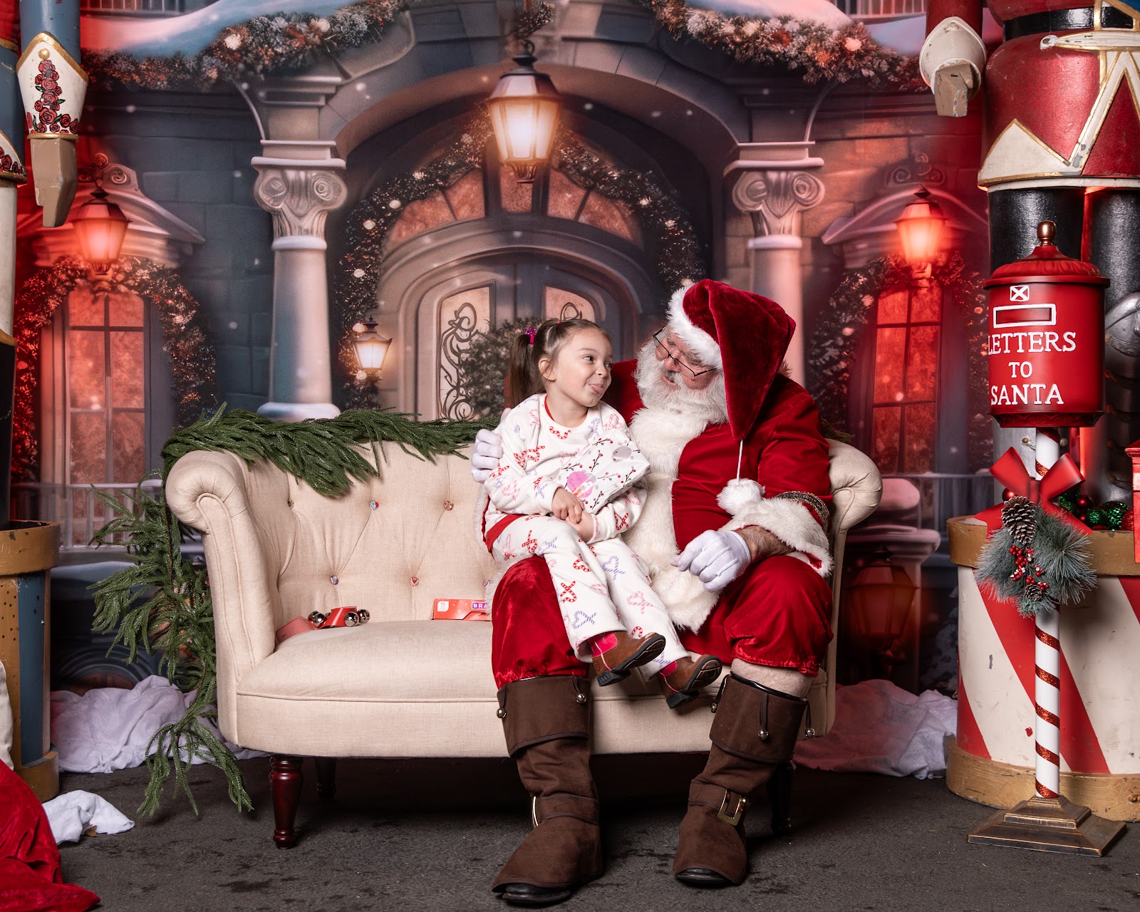 Santa Claus posing with happy children and families