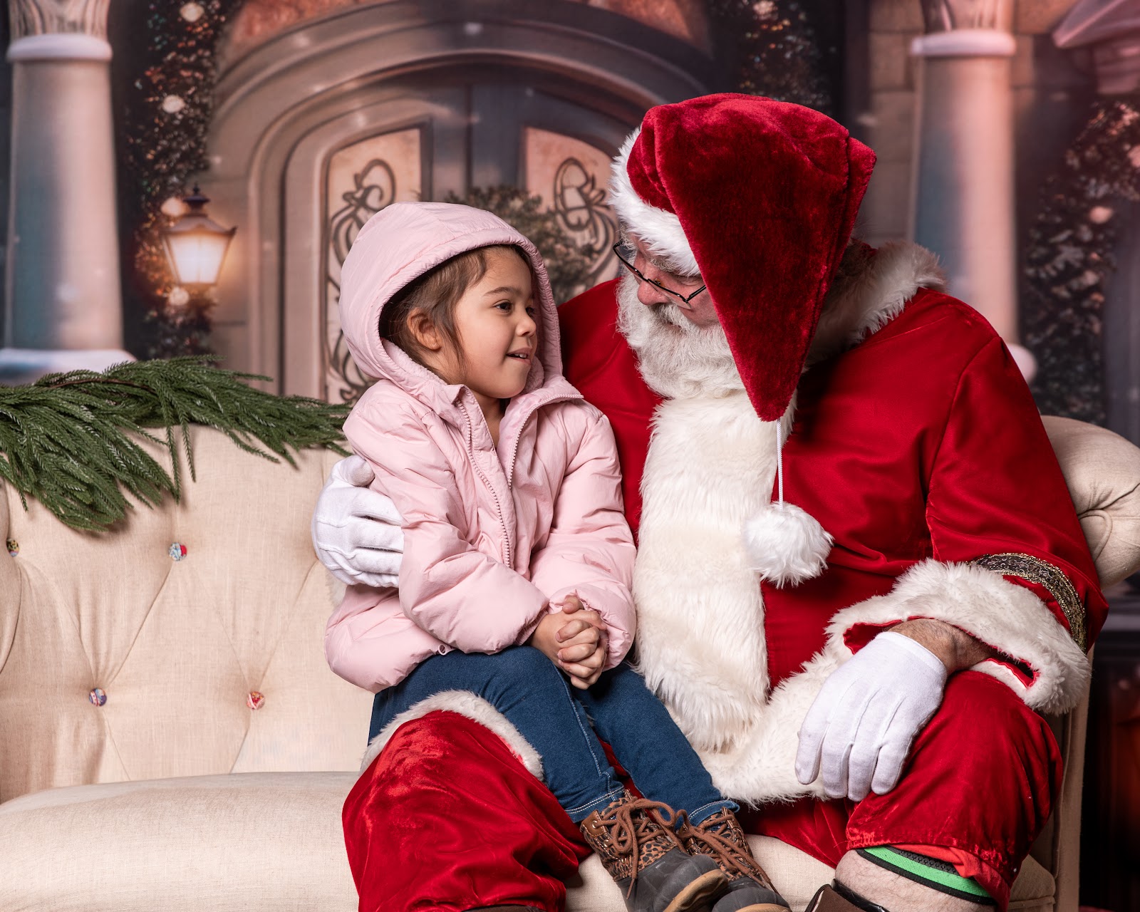 Families gathered together enjoying Santa visit at Skate Night