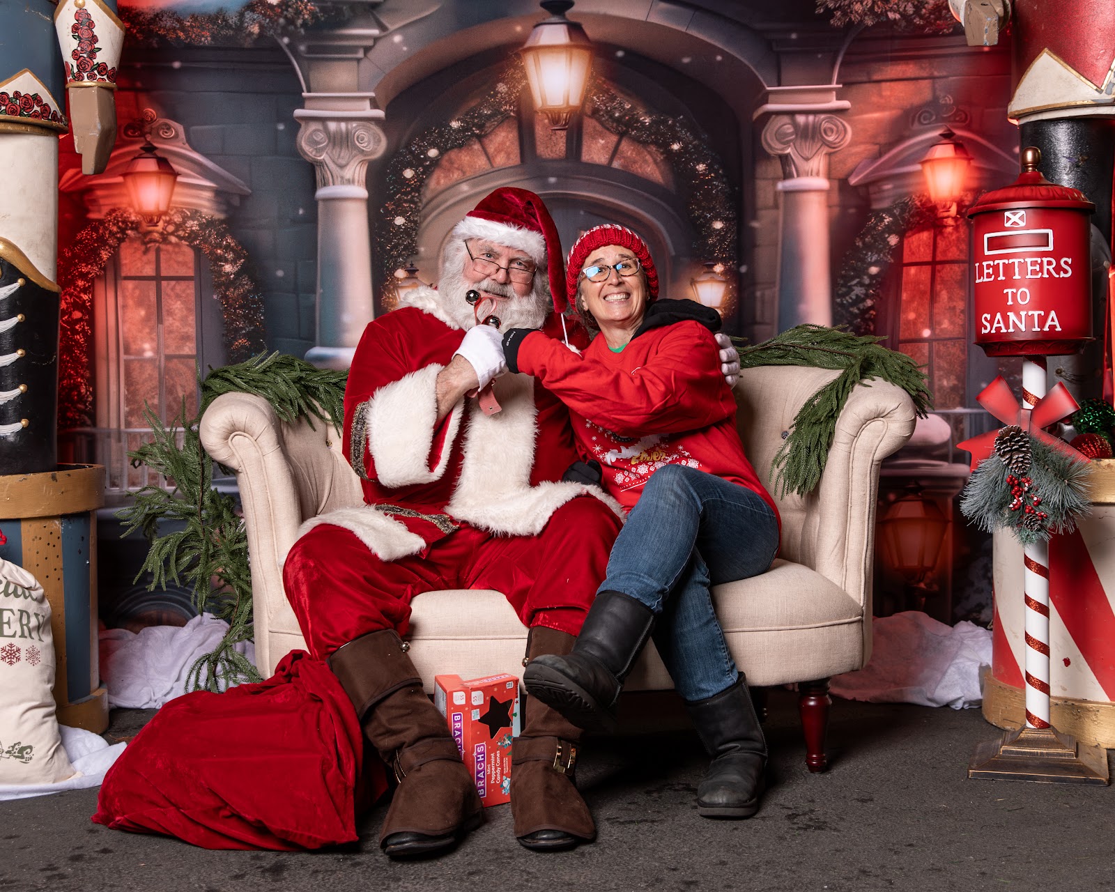 Santa Claus greeting children at Skate Night