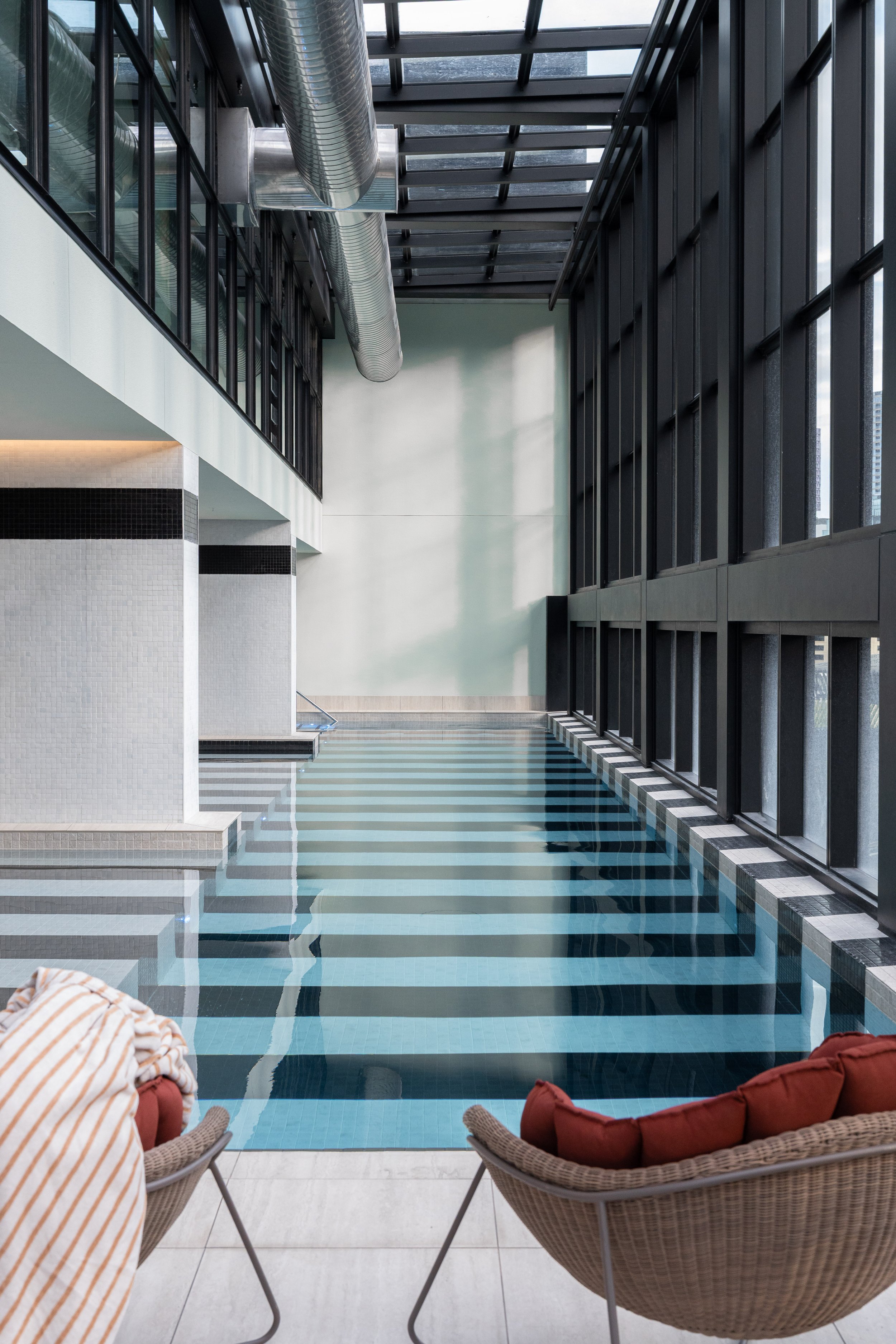 Hannah St Hotel hospitality interior, warm light and textured surfaces