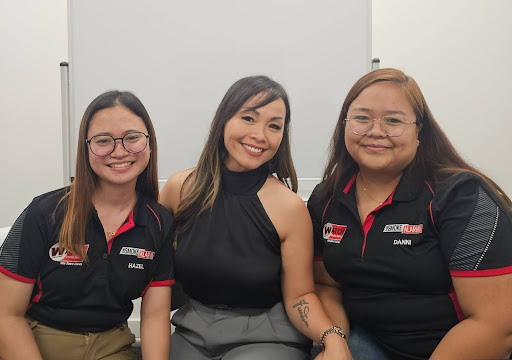 Sales virtual assistant Hazel (left), me, Linh Podetti (centre), and sales VA Dannisse (right) when we met up in Brisbane in December 2024.