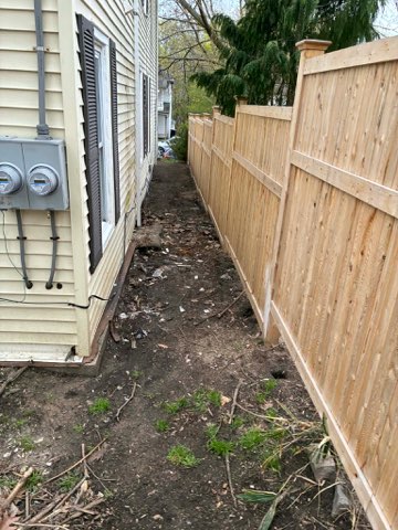 Fernando's cleanout work completed along fence line in the Pioneer Valley