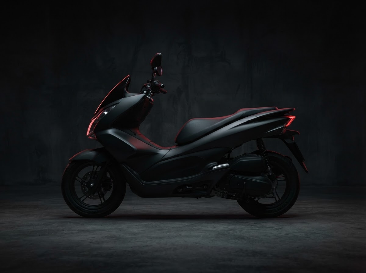 Rocket 150 — a scooters on a dark studio backdrop, no brand logos