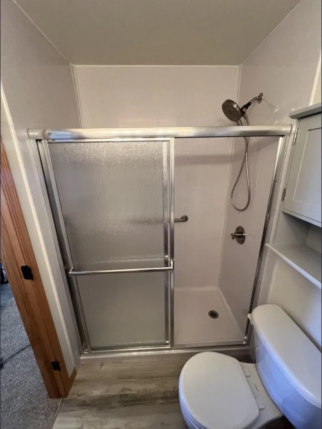 Full walk-in shower replacement in residential bathroom