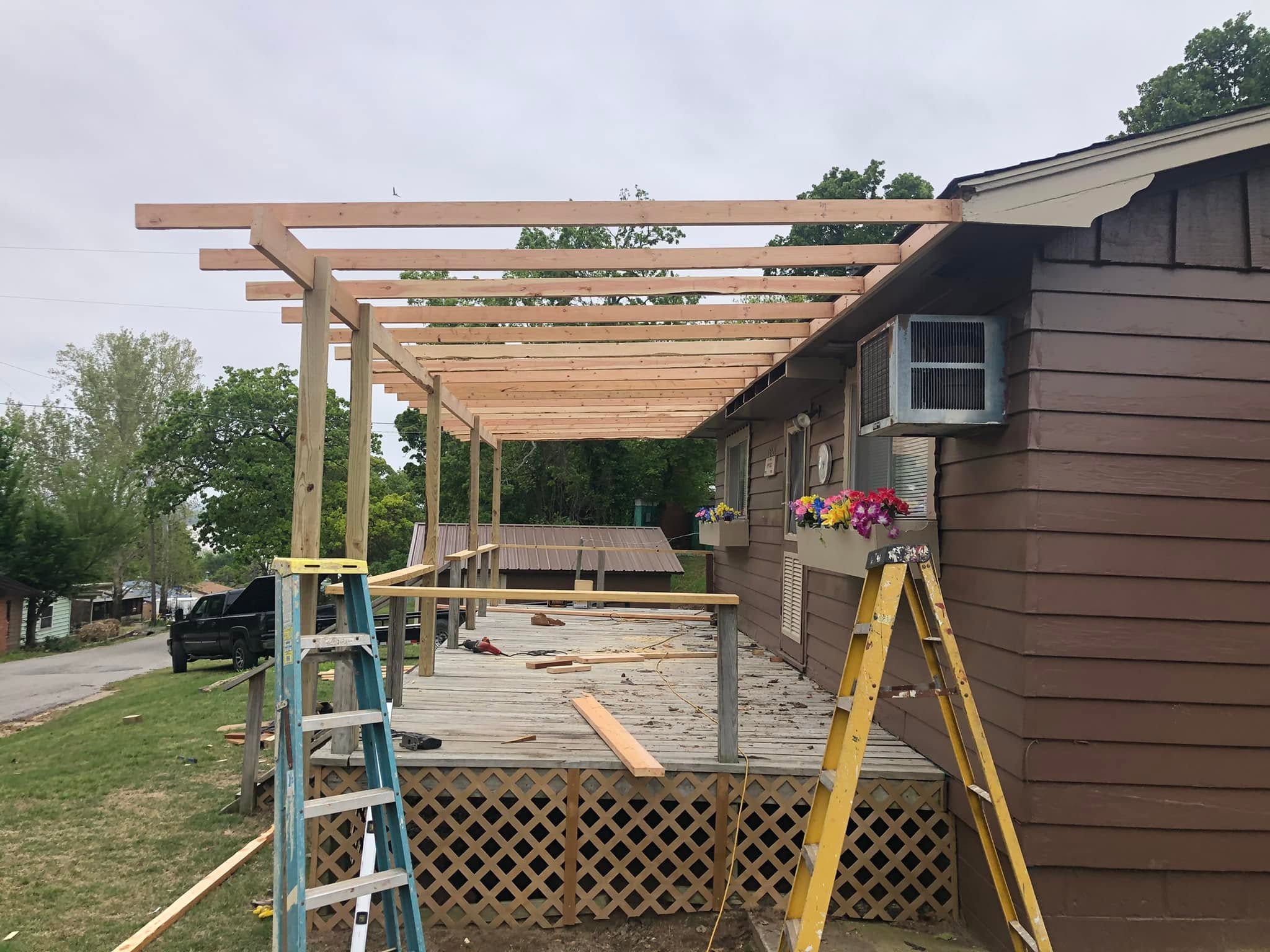 Covered Porch Addition & Metal Roof Structure — In Progress · Framing Add-On