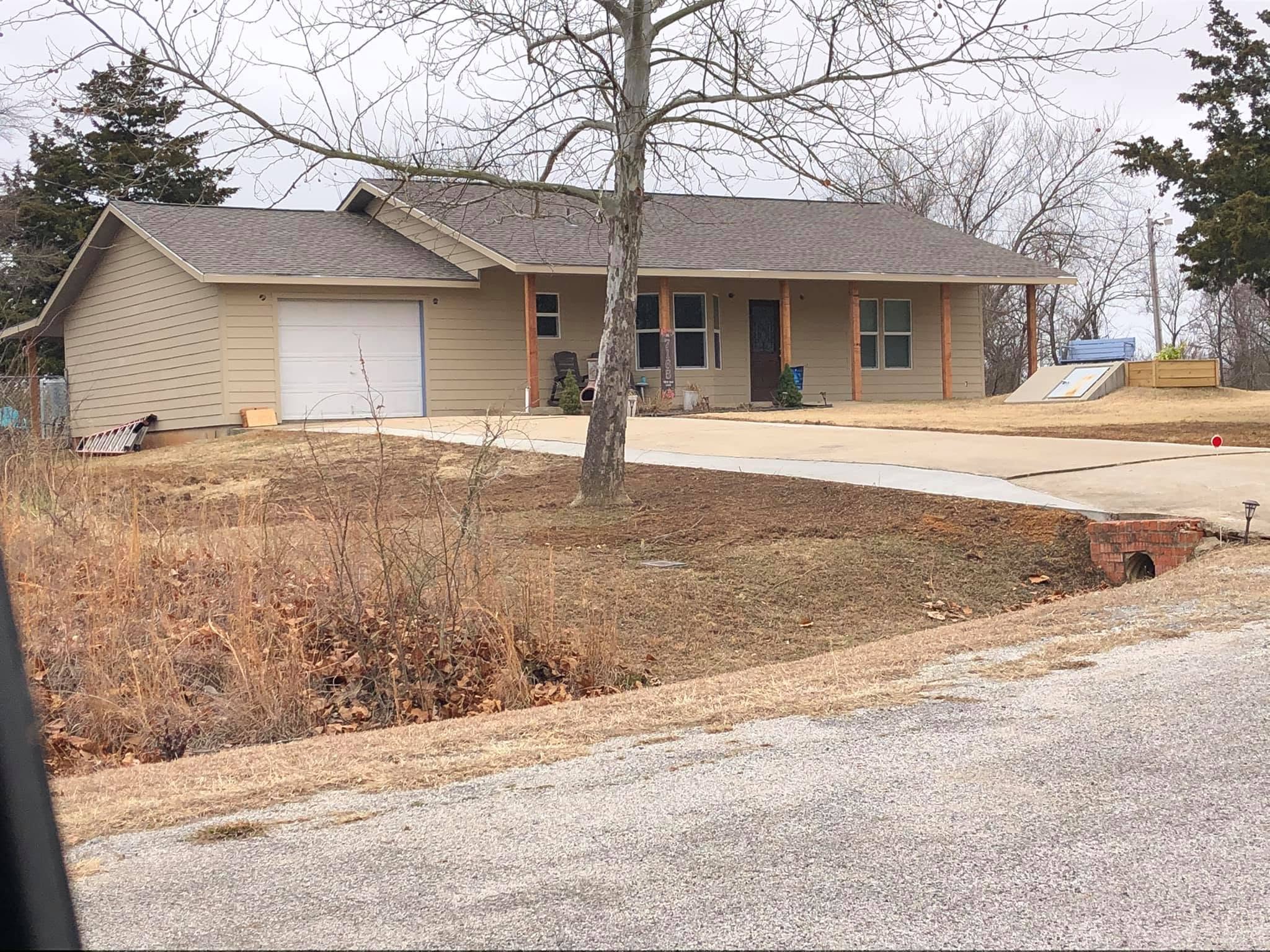 Full Siding Replacement & Porch Remodel — Completed Exterior