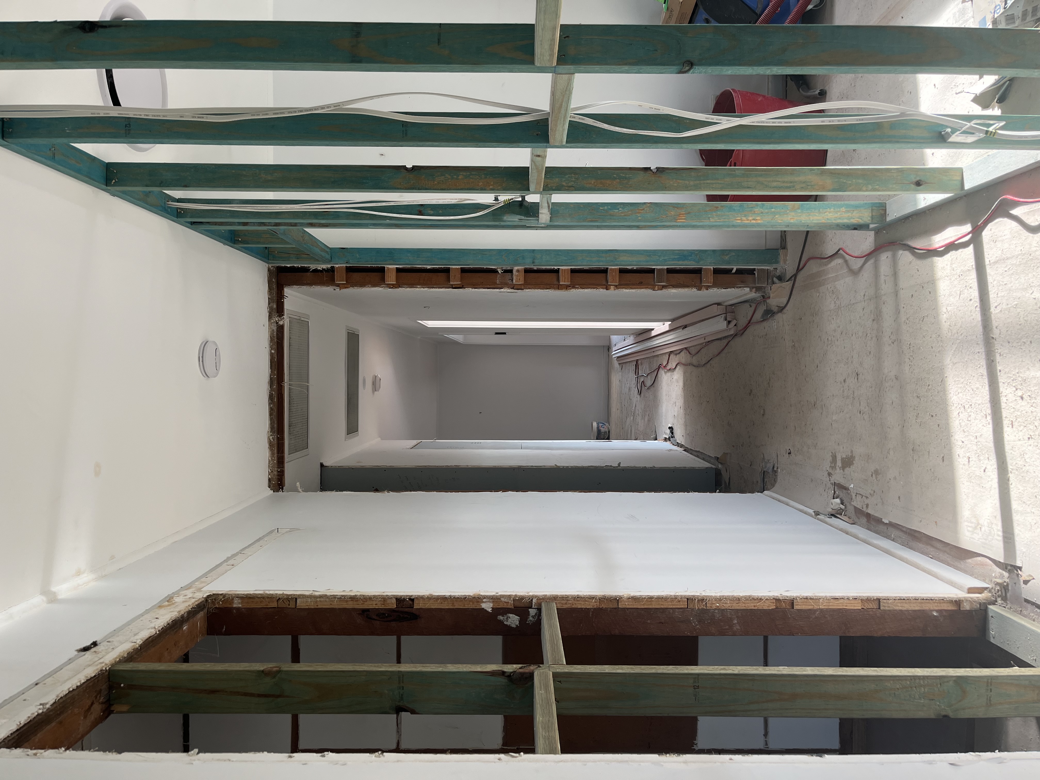 Denham St Tarragindi - Interior ceiling bulkheads, H2 treated framing & electrical rough-in for new living spaces