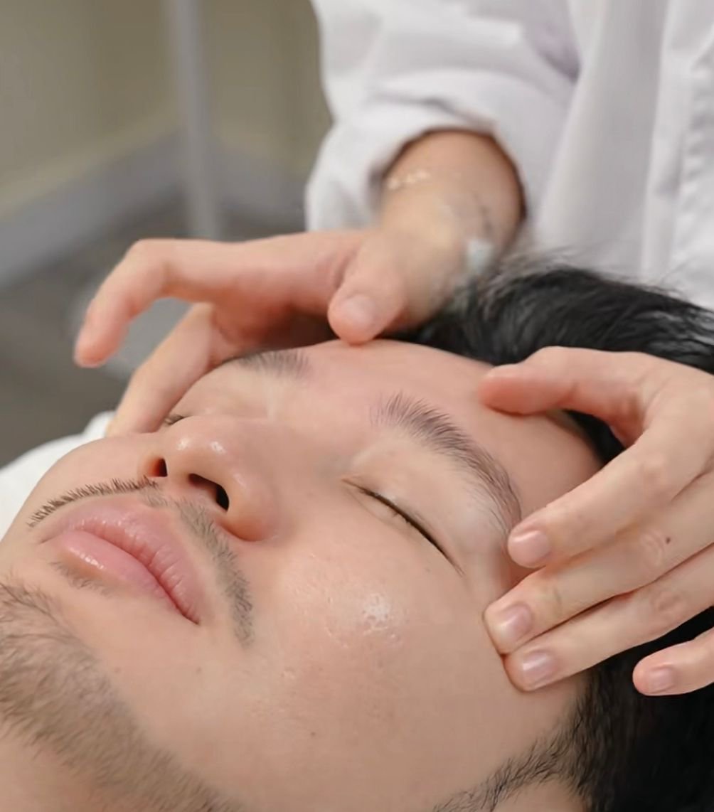 A calm, welcoming spa setting with relaxing eye massage