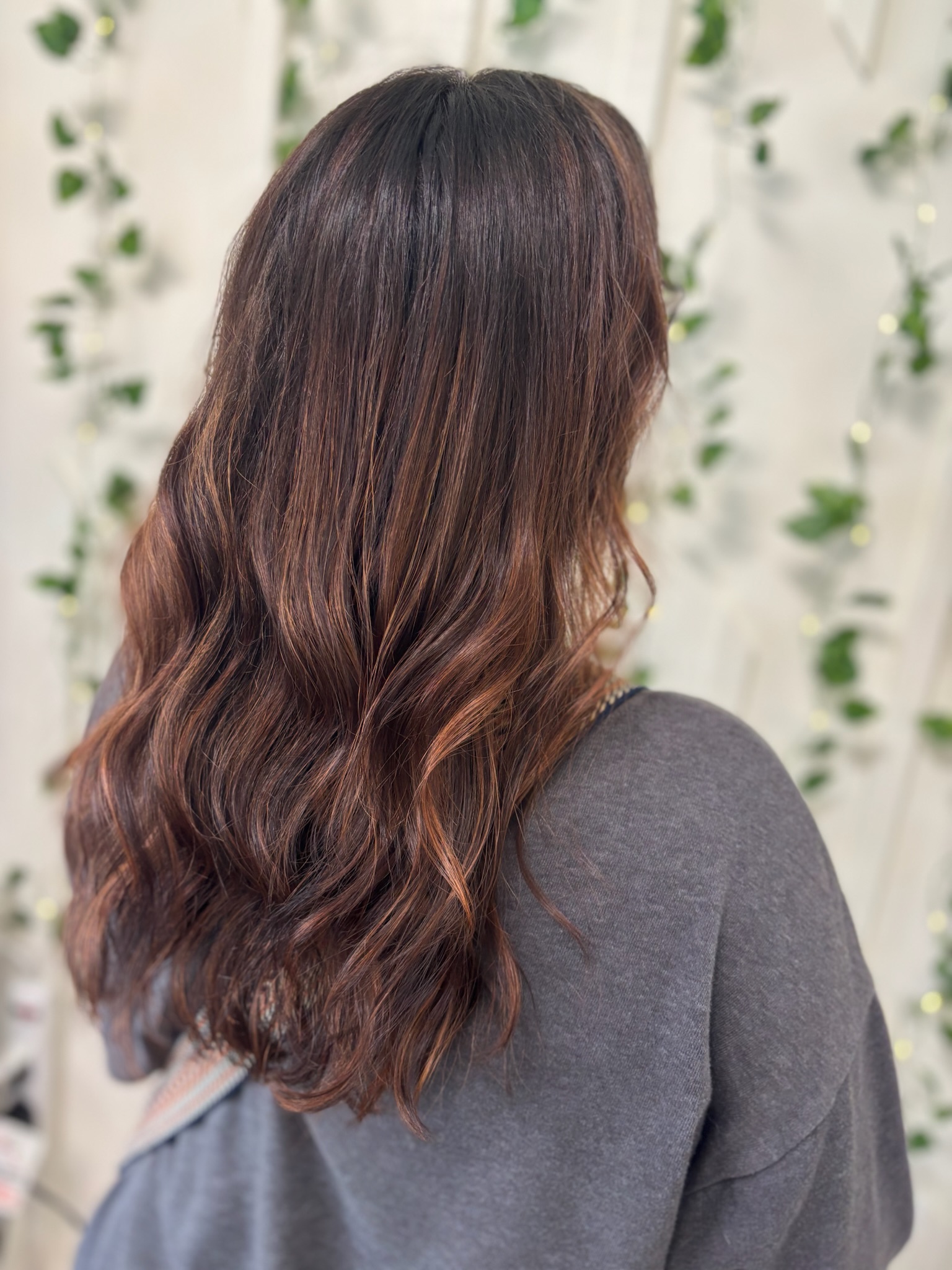 Rich chocolate brunette with dimensional copper-auburn ribbons and soft beachy waves by Kalene