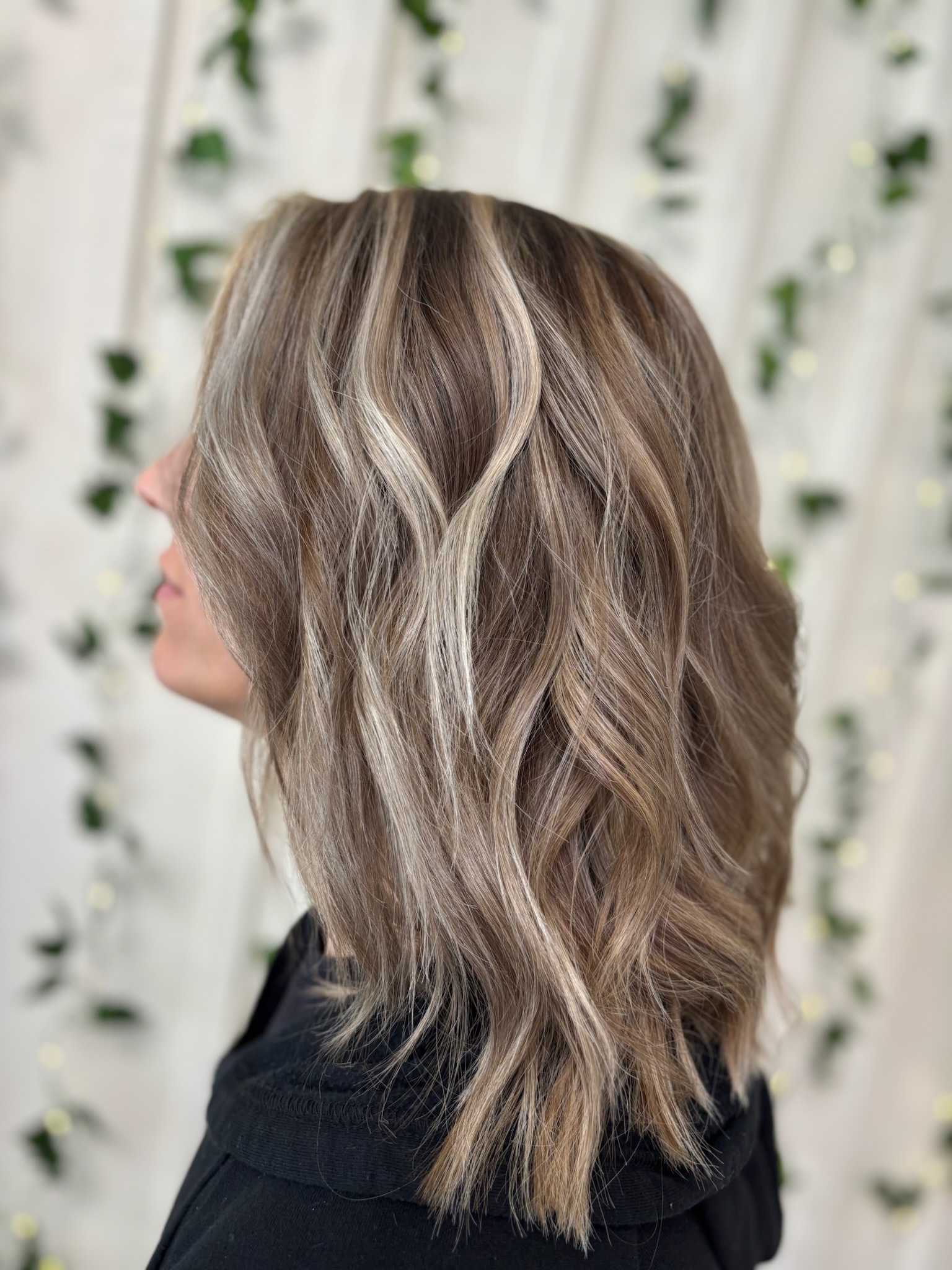 Soft dimensional ash blonde highlights with effortless textured waves by Kalene