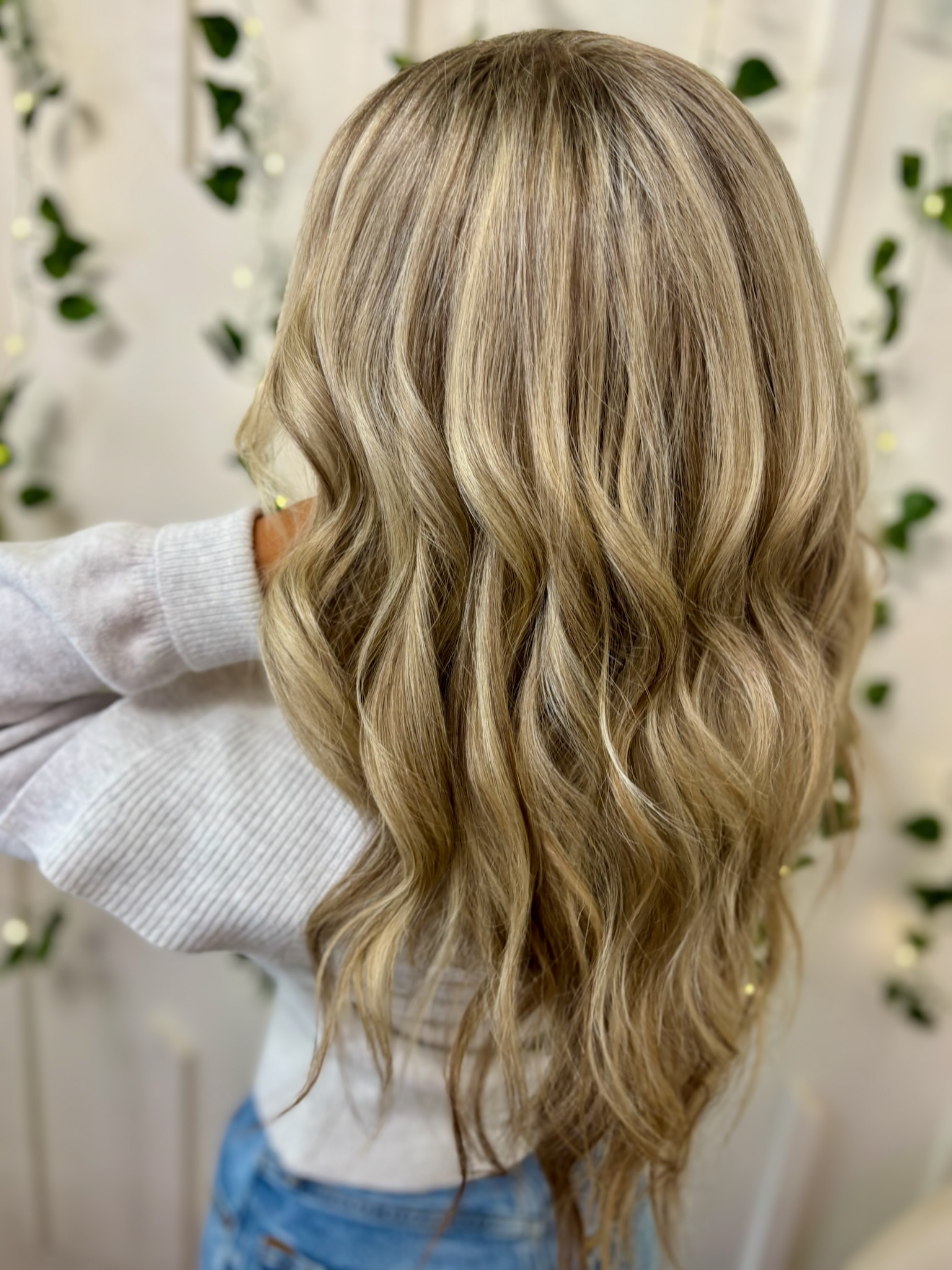 Sun-kissed honey blonde full highlights with soft natural waves by Kalene