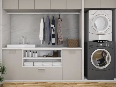 Custom laundry renovation with built-in storage and washer dryer setup
