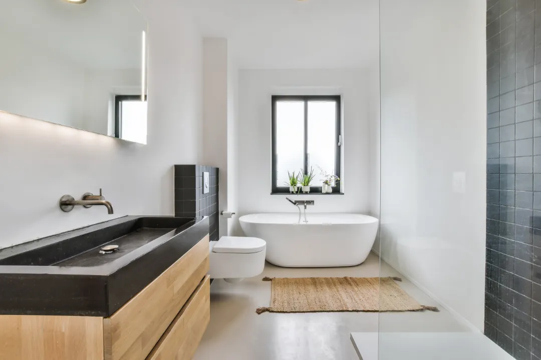 Canberra bathroom renovation with freestanding bath and modern concrete vanity