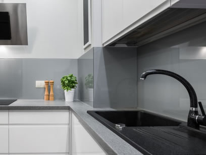 Modern kitchen renovation with stone benchtops and sleek cabinetry