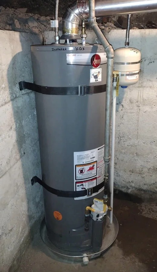 Gas water heater with expansion tank installed by Frosty's Elite Water Heater Service in a Northern Utah basement