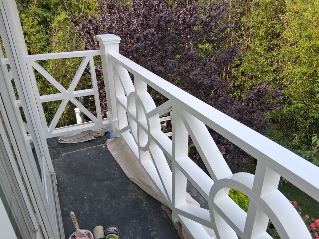 Architectural Railing Detail — Post Caps & Cross-Brace Finishing