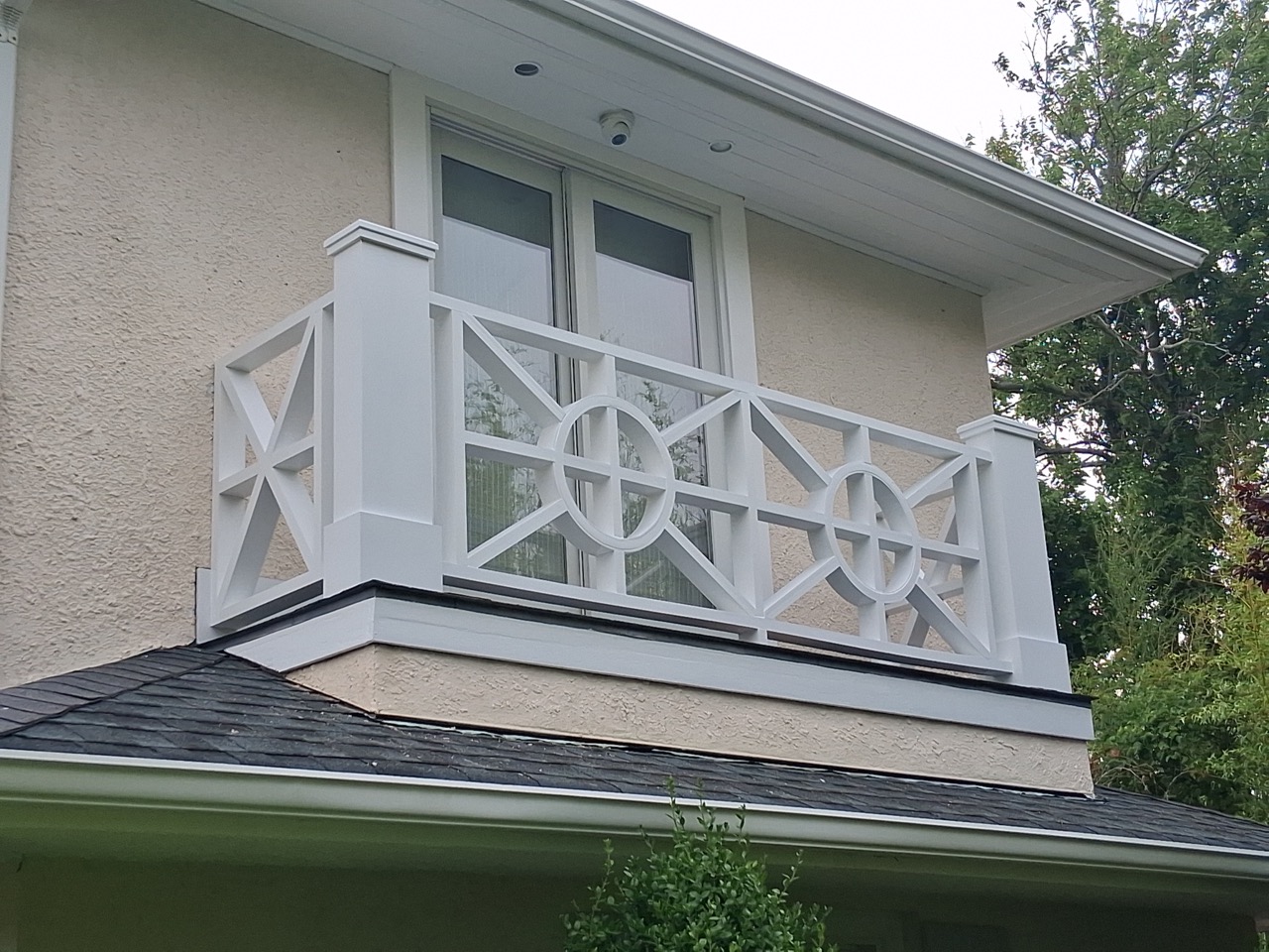 Custom architectural balcony railing with brilliant white protective enamel finish
