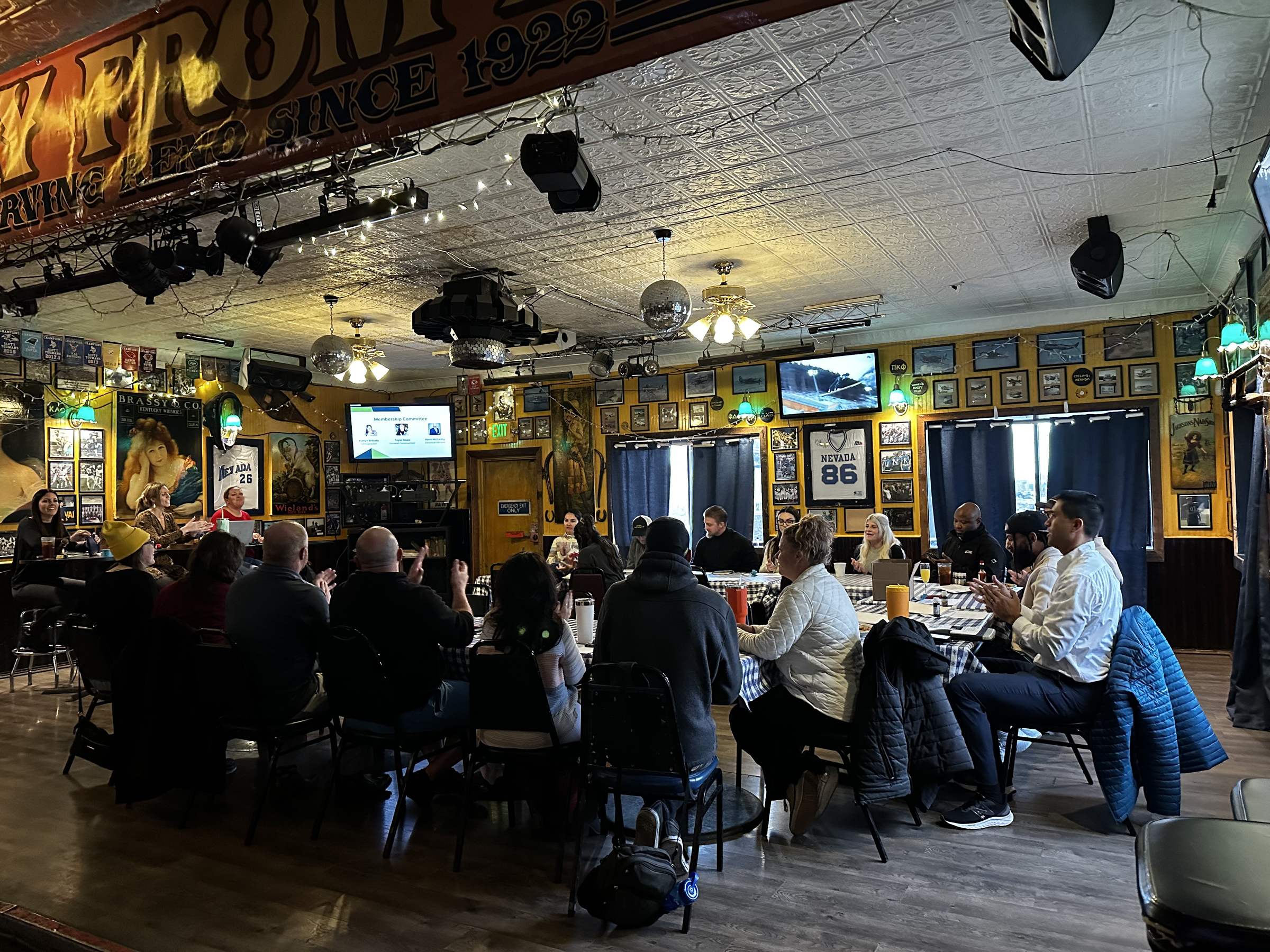 Packed room of Midweek Masterminds chapter members at a Wednesday meeting at Little Waldorf Saloon