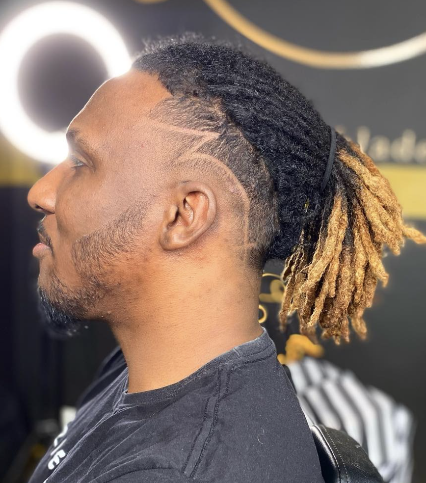 Textured taper fade with clean razor temple lines at The Cut Barber Lounge, Scarborough