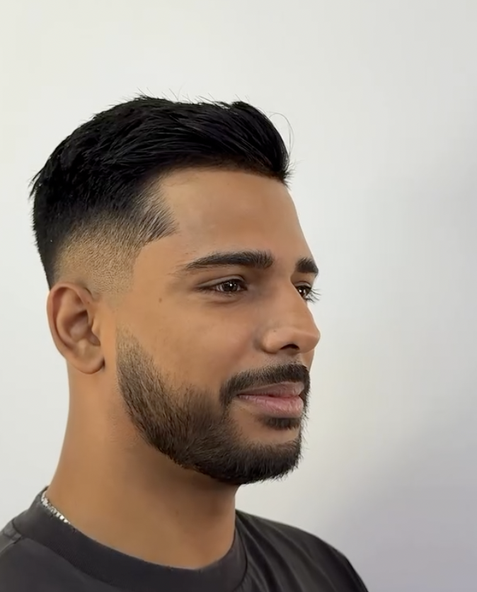 Fresh taper fade with textured styling and crisp beard lineup at The Cut Barber Lounge, Scarborough