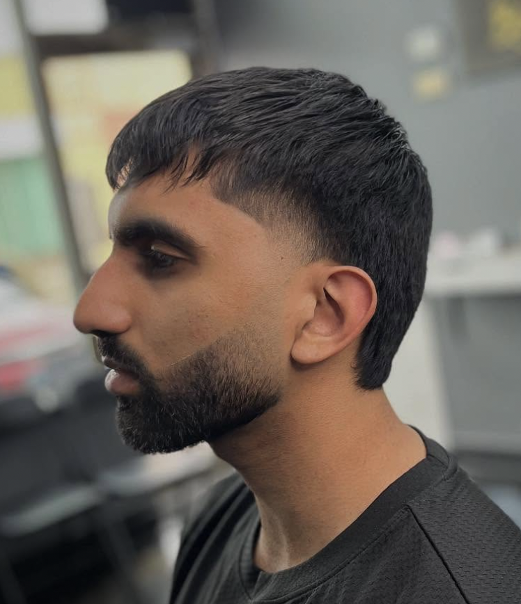 Modern textured crop with sharp taper fade and beard lineup at The Cut Barber Lounge, Scarborough