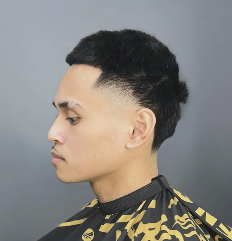 Textured blowout taper fade with temple lineup at The Cut Barber Lounge, Scarborough