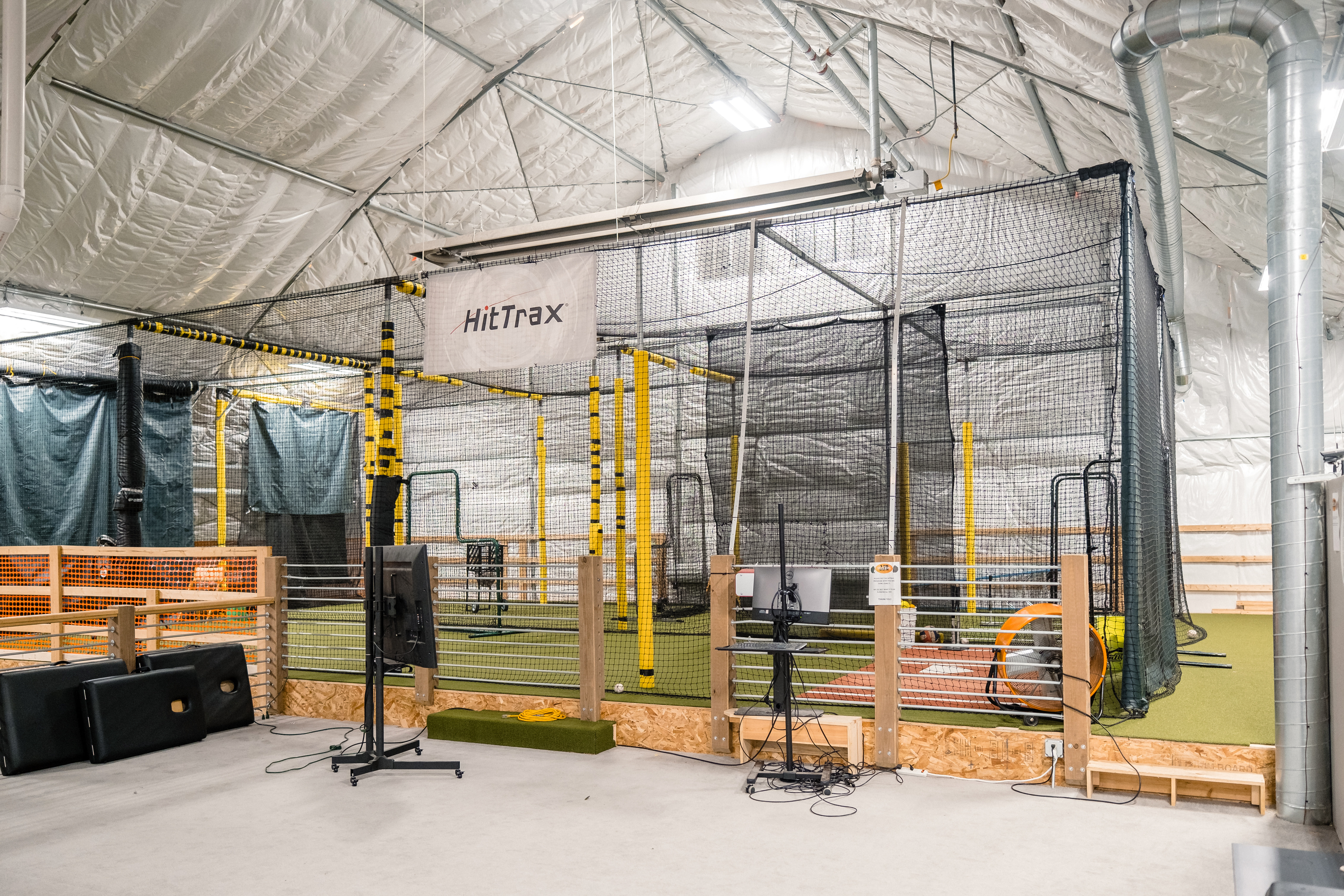 Indoor batting cages and turf area inside the JJR LaSalle sports dome