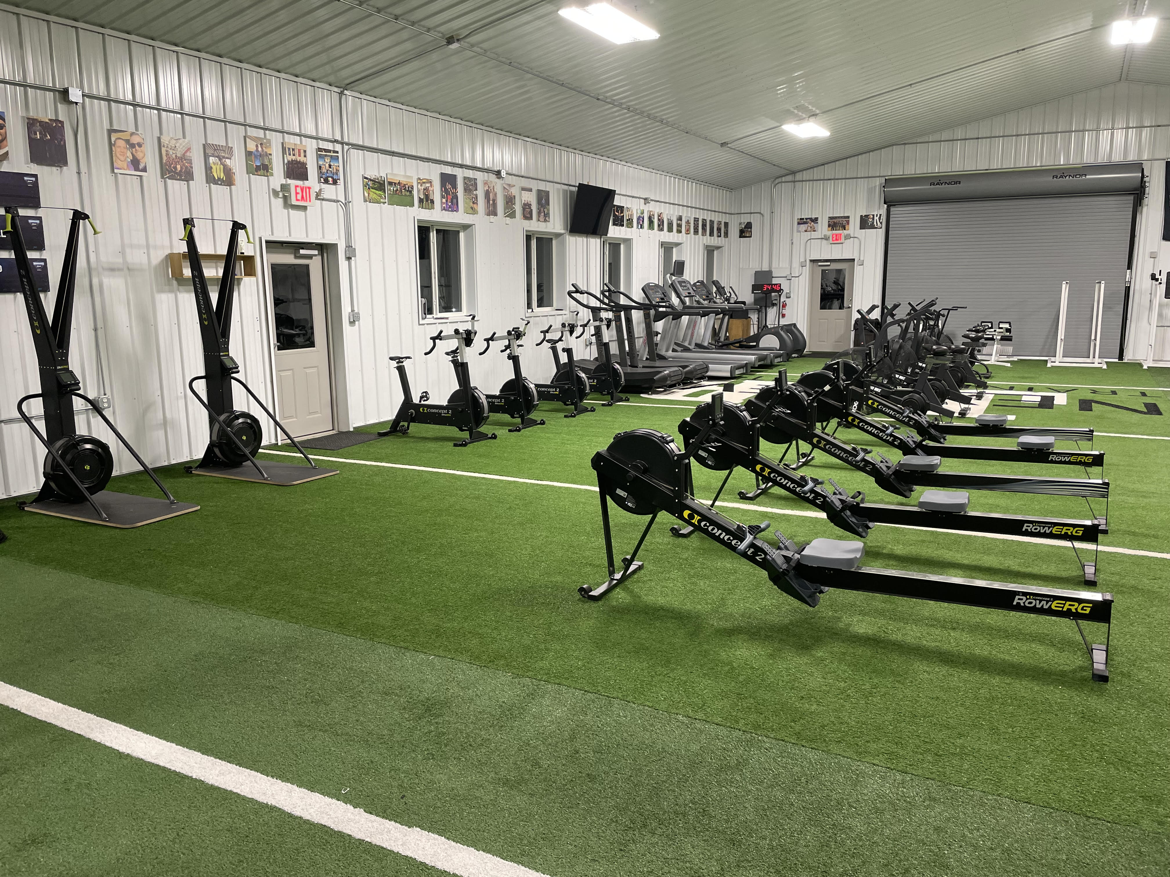 Cardio and conditioning equipment including rowers and SkiErgs along the JJR LaSalle training floor