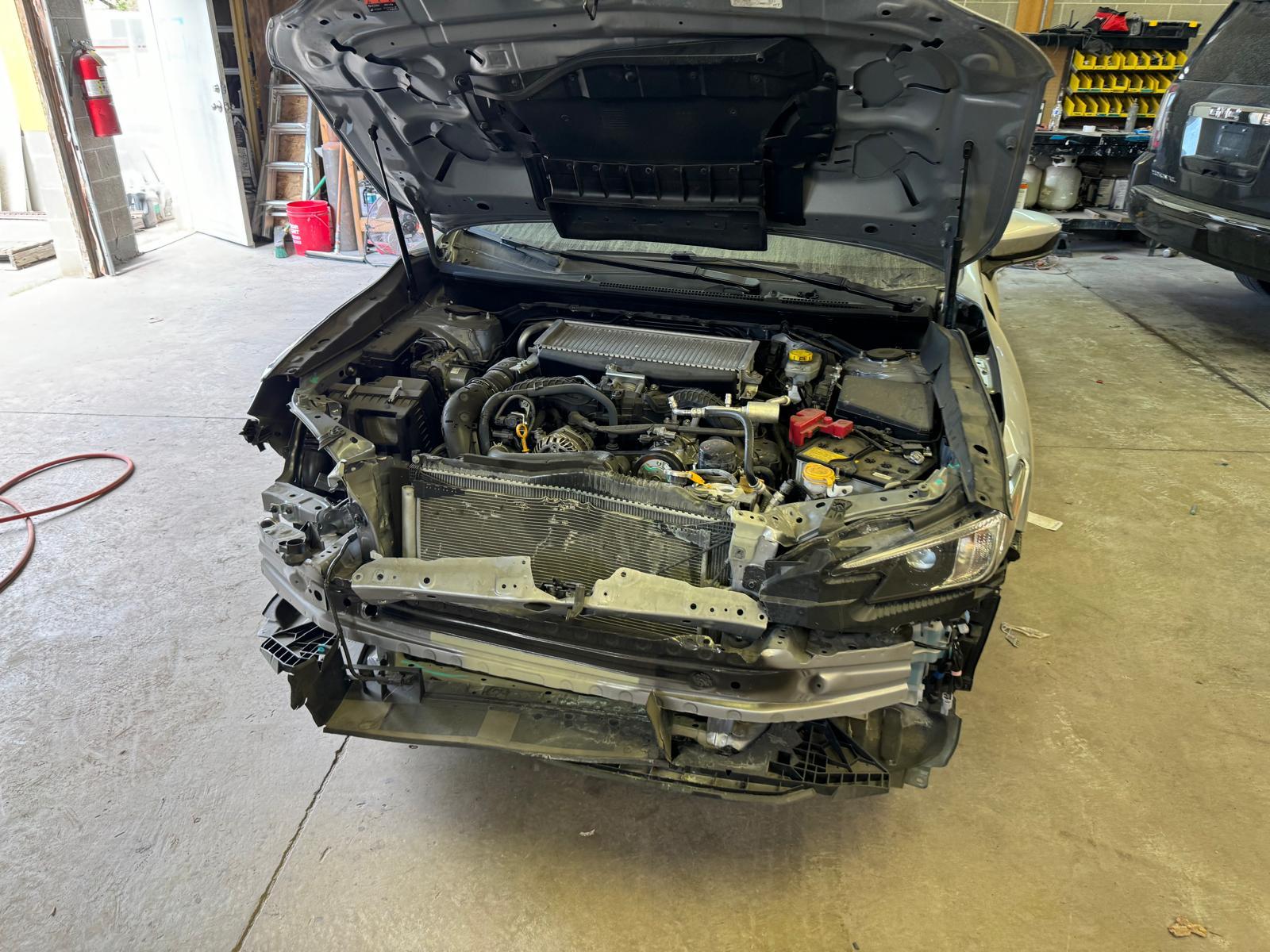 front end collision disassembly and radiator support rebuild by Salgado's Auto Spot in Taylorsville UT