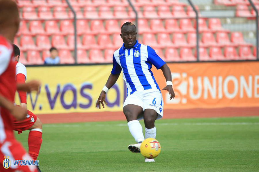 Tonny Mawejje in a KF Tirana football kit during a match in Albania, career archive.