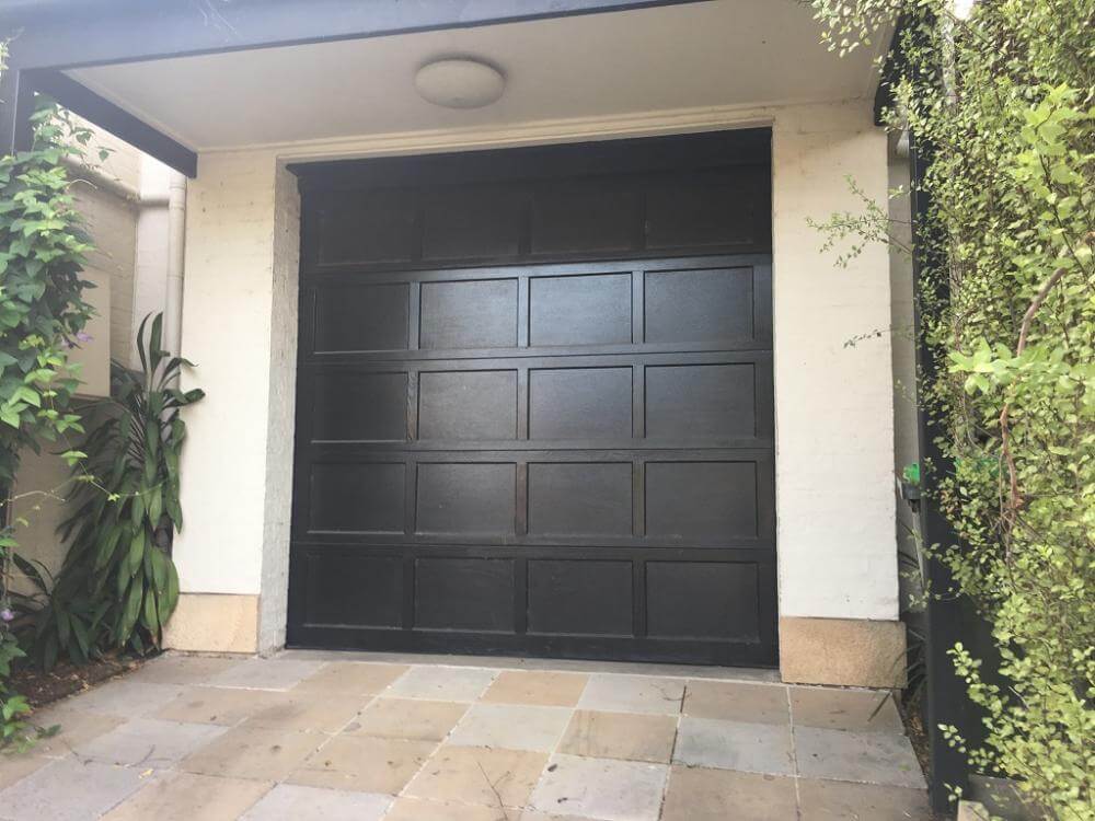 Recessed ply panel garage door installation in Dandenong, VIC.